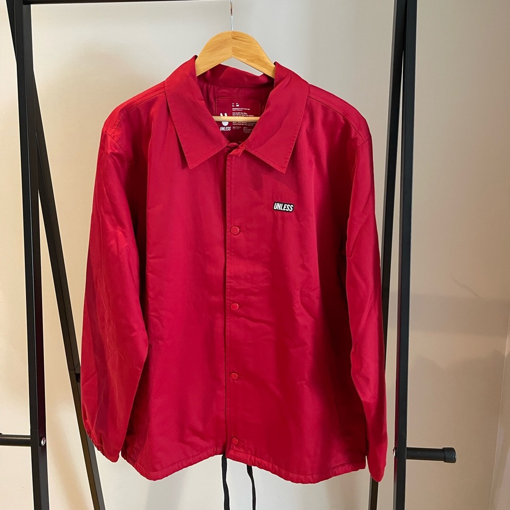 Unless Collective Unisex Red Coaches Jacket - Womens L/Mens M.
